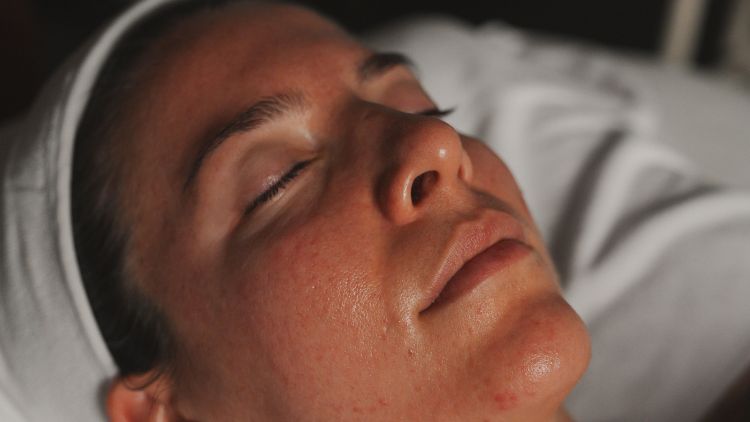 Close-up of skin during an in-clinic skincare appointment