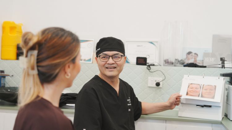 Dr Wong discussing anatomy during consultation